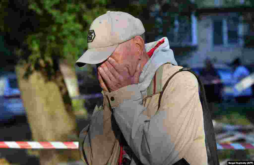 A local man at the scene of a missile explosion in Kyiv on June 1.&nbsp; Urgent inspections were called after three people, including a 9-year-old girl, died outside a locked bomb shelter in northeastern Kyiv amid a missile attack on the Ukrainian capital on June 1.&nbsp;