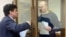 Vladimir Kara-Murza (right) and his lawyer, Vadim Prokhorov, are seen attending a pretrial hearing at the Moscow City Court on March 6.