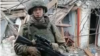 Rustyam Abushaev posted a video of himself in combat gear amid the ruins of a residential area that had been leveled by fighting.