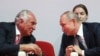 Russian billionaire Vasily Anisimov (left) with Russian President Vladimir Putin in 2019. 