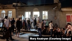 Nagorno-Karabakh - People wait in a line outside a bakery in Stepanakert, August 8, 2023.