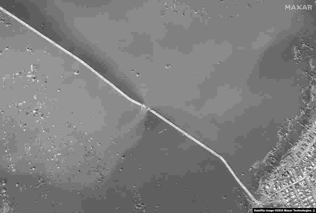 A before-and-after view of an embankment collapse over the Ural River tributary Russia continues to struggle to contain the flooding, which resulted from swiftly melting snow and a dam breach in the city of Orsk.