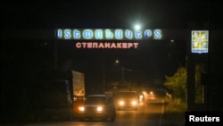 Nagorno-Karabakh - Residents drive cars as they leave Stepanakert following a military operation conducted by Azerbaijani forces i, September 24, 2023.