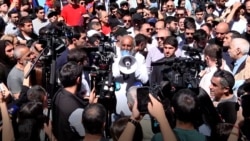 Armenian Students Join Firebrand Archbishop In Anti-Government Protests