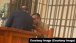 Владимир Кадариянын сот залындагы сүрөтү. 
