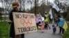 A protest in front of the headquarters of International Olympic Committee in Lausanne, Switzerland, on March 25.