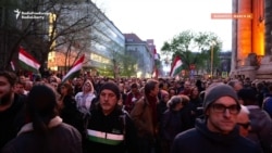'Lock Them Up!' Thousands Join Rally Of Former Hungarian Government Insider
