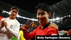  Түштүк Корея курамасынын капитаны Сон Хын Мин. 