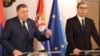 Bosnian Serb leader Milorad Dodik and Serbian President Aleksandar Vucic attend a press conference in Belgrade on April 14.