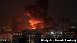 UKRAINE - An explosion is seen in the sky over Kyiv during a Russian missile strike, August 30, 2023.