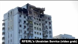 Пошкоджений внаслідок нічної атаки будинок в Голосіївському районі Києва, 30 травня 2023 року 