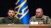 Ukrainian President Volodymyr Zelenskiy (left) at the appointment of Vasyl Malyuk (right) to the leadership of the Security Service of Ukraine, in Kyiv on February 13, 2023.