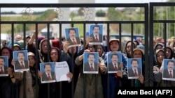 Members of the MEK protest on June 20 in Tirana after Albanian police raided a camp.