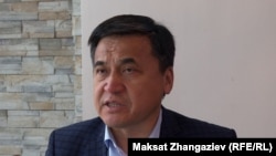 Каныбек Иманалиев.