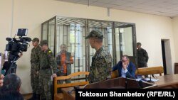 Олжобай Шакир в зале суда. 