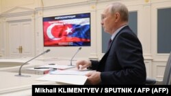 Ռուսաստանի նախագահ Վլադիմիր Պուտինը տեսակապով մասնակցում է Թուրքիայի «Ակկույու» ԱԷԿ-ի առաջին էներգաբլոկում միջուկային վառելիքի ներբեռնման արարողությանը, Մոսկվա, 27-ը ապրիլի, 2023թ.