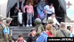 Жители Нагорного Карабахе перевозятся в расположение российских миротворцев, 20 сентября 2023 г․