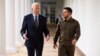 Ukrainian President Volodymyr Zelenskiy (right) walks with U.S. President Joe Biden at the White House on September 21, 2023.