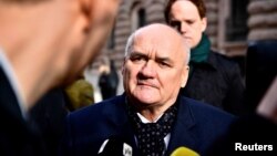 Hungarian deputy parliament speaker Csaba Hende talks with the media after a meeting in Stockholm on March 7.