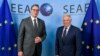 EU foreign policy chief Josep Borrell (right) with Serbian President Aleksandar Vucic in Brussels on June 22.
