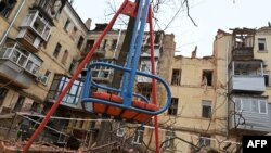 Пошкоджений російськими обстрілами будинок у Харкові, 30 січня 2023 року