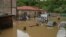 Armenia - Flooded homes and cars in the town of Alaverdi, May 26, 2024.