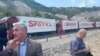 Armenia - U.S. diplomat John Allelo (left) inspects an Armenian aid convoy stuck near the Lachin corridor July 28, 2023.