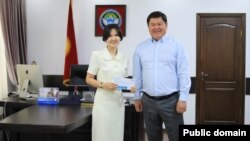 Исанбек кызы жана Талантбек Иманов.