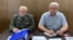 Retired intelligence Colonel Vladimir Kvachkov (left) told a court on August 15 that Russian President Vladimir Putin and the Defense Ministry "discredit the armed forces as they do not know how to conduct a war."