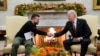 U.S. President Joe Biden (right) shakes hands with Ukrainian President Volodymyr Zelenskiy as they meet in the Oval Office of the White House in Washington on December 12. 
