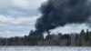 Video of the crash shows a plume of black smoke rising from the crash site near the airfield.