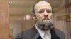 Vitaly Koltsov appears in court in Moscow on June 14.