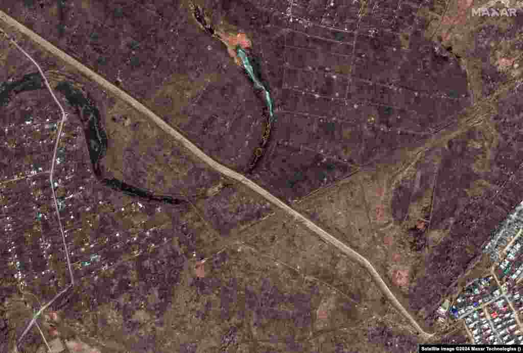 A before-and-after view of an embankment collapse over the Ural River tributary Russia continues to struggle to contain the flooding, which resulted from swiftly melting snow and a dam breach in the city of Orsk.