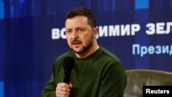 Ukraine's President Volodymyr Zelenskiy speaks during 'Ukraine. Year 2024' conference, in Kyiv, February 25, 2024.