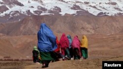 Оогандык кыз-келиндер. Сүрөт иллюстрация үчүн колдонулду.