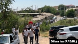 Похороны убитого ребенка в селе Жибек Жолы