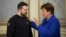 Ukrainian President Volodymyr Zelenskiy (left) and IMF chief Kristalina Georgieva talk in Kyiv on February 20. 