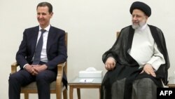 Իրանի նախագահ Էբրահիմ Ռաիսի և Սիրիայի նախագահ Բաշար ալ-Ասադ, Թեհրան, 8-ը մայիսի, 2023թ.