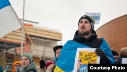 Никита Кириллов на антивоенной акции в Финляндии