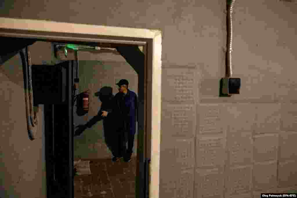 A man gives journalists a tour of a bomb shelter in Kyiv.&nbsp; On June 5, Kyiv Mayor Vitali Klitschko posted a video showing him continuing to inspect shelters in the Ukrainian capital amid a bitter blame game over the neglected public shelters.&nbsp;