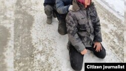 Скриншот  с видео, снятого во время рейда против мигрантов в Санкт-Петербурге. 