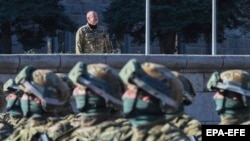 Azerbaijani President Ilham Aliyev presides over a military parade in the former capital of the Nagorno-Karabakh region known to Armenians as Stepanakert and in Azeri as Khankendi, on November 8. 