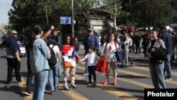 Armenia - Anti-government protesters block a street in downtown Yerevan, May 13, 2024.
