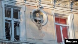 Broken windows are seen near the site of a Russian missile strike. (file photo)