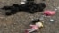Nagorno-Karabakh - A doll and children's personal belongings lie on the ground in Stepanakert, October 2, 2023. 