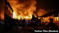 IN PHOTOS: Russian Drones Strike Kharkiv In Ukraine's Northeast