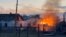 A building burns in the town of Sudzha following an incursion of Ukrainian troops into Russia's Kursk region in this still image from video taken on August 7.