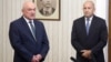 Bulgarian President Rumen Radev (right) meets with interim Prime Minister Dimitar Glavchev.