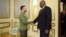 Ukrainian President Volodymyr Zelenskiy (left) meets U.S. Defense Secretary Lloyd Austin in Kyiv on November 20.