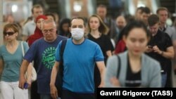 Russian officials have recommended residents wear masks and get another vaccine shot.
